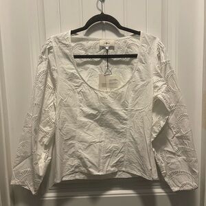7 for all Mankind 
Women’s size Small
NWT 
White Eyelet Long Sleeve Top